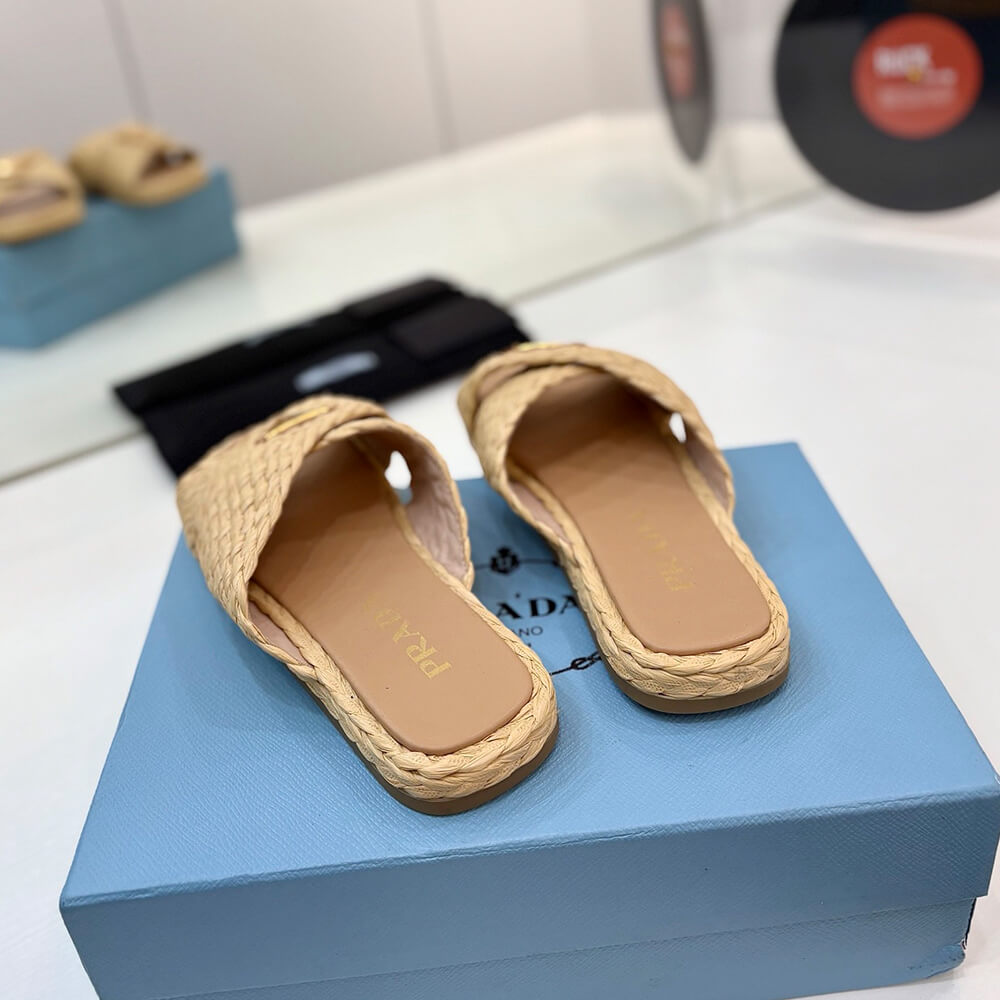 Pra*a Raffia crisscross slides