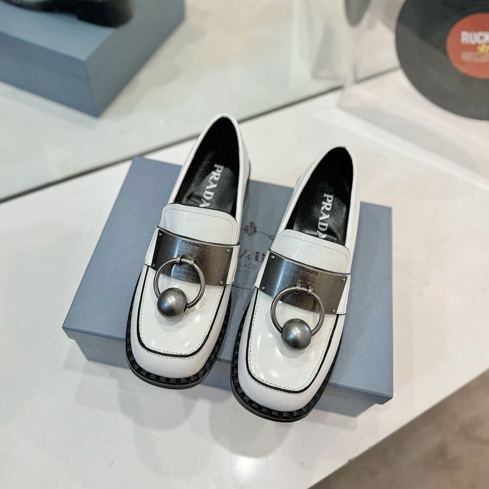 Pra*a Brushed leather loafers with metal details
