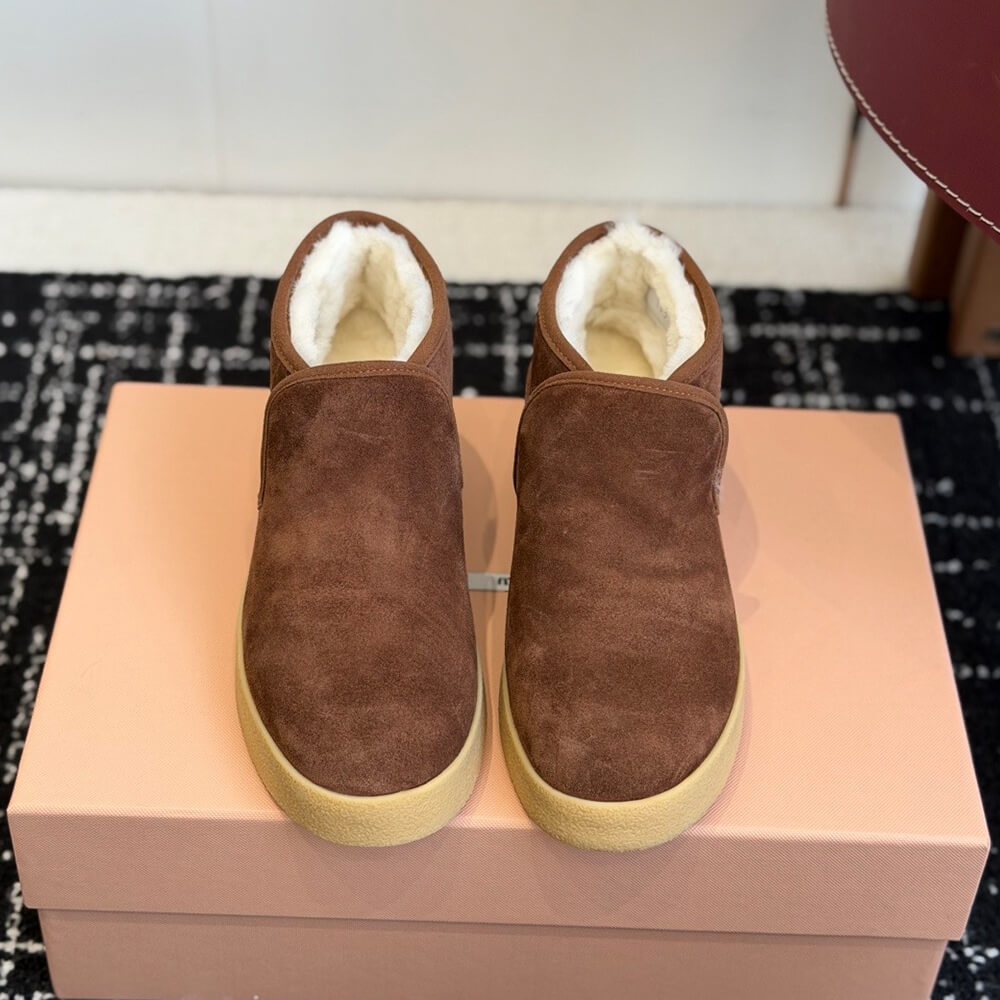 M1um1u Suede and shearling slip-on booties