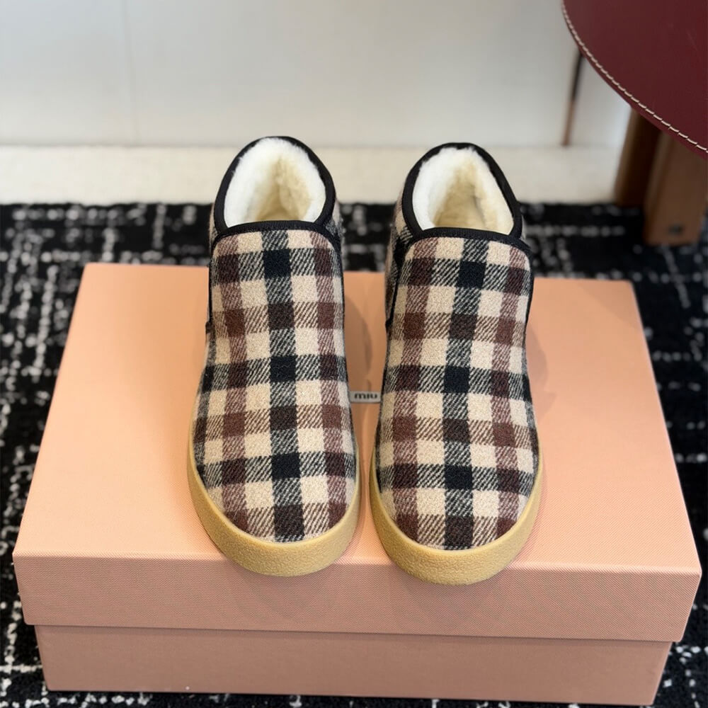 M1um1u Wool and shearling slip-on booties