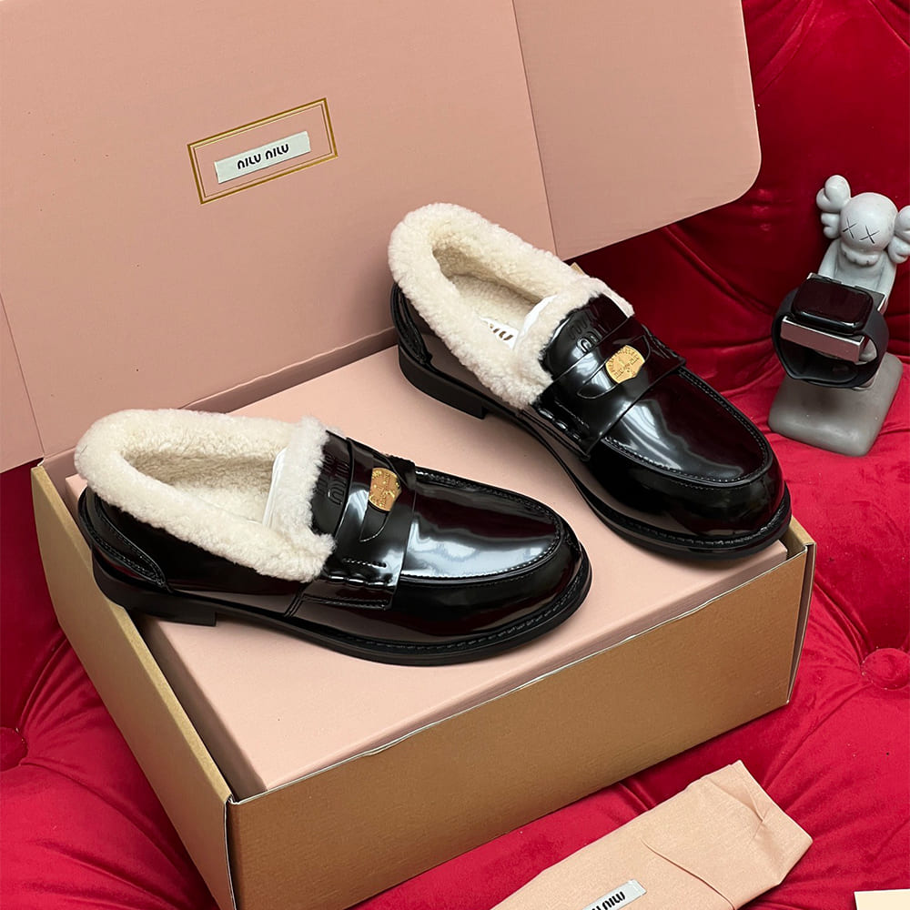 M1um1u Bleached leather and shearling penny loafers