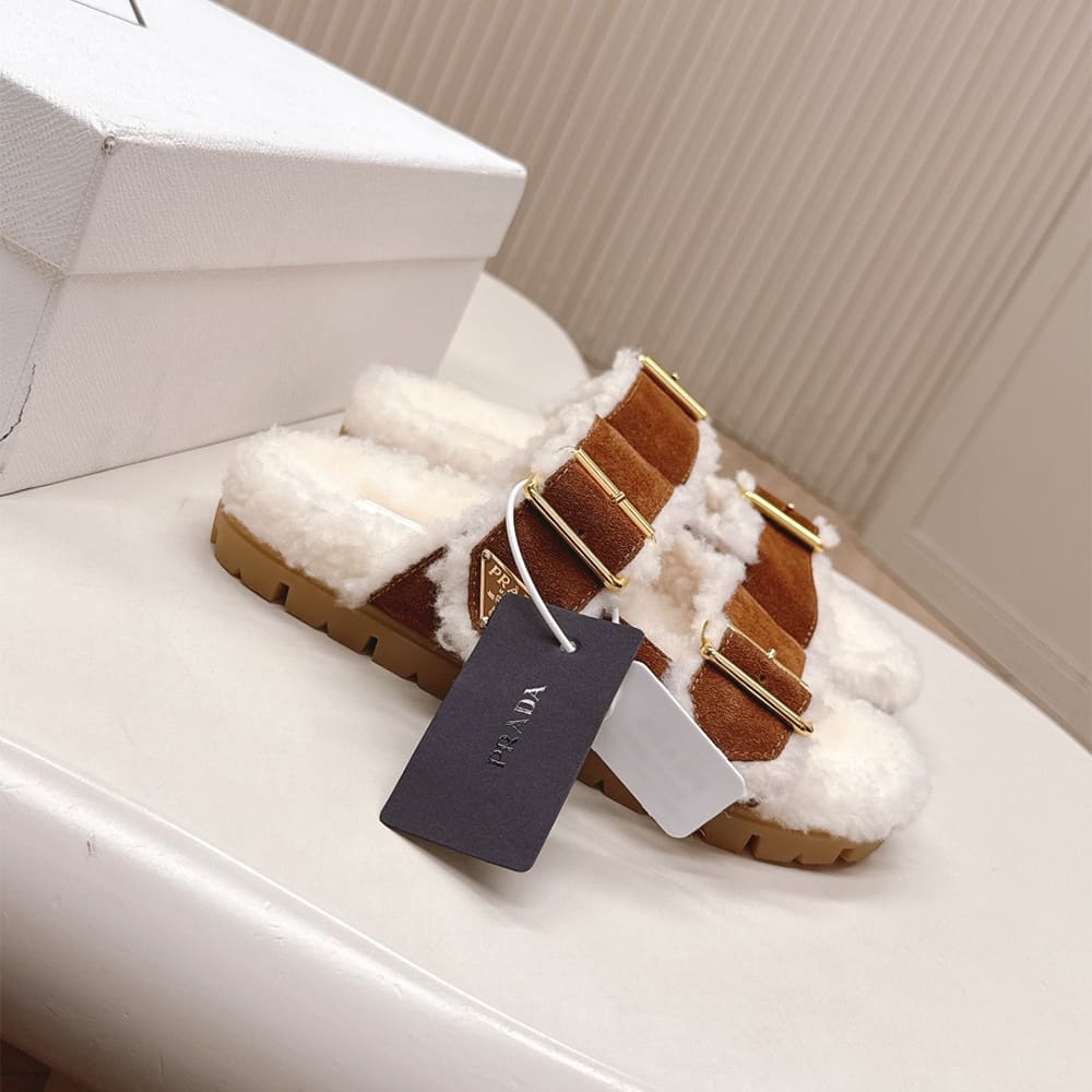 Pra*a Suede and shearling slides