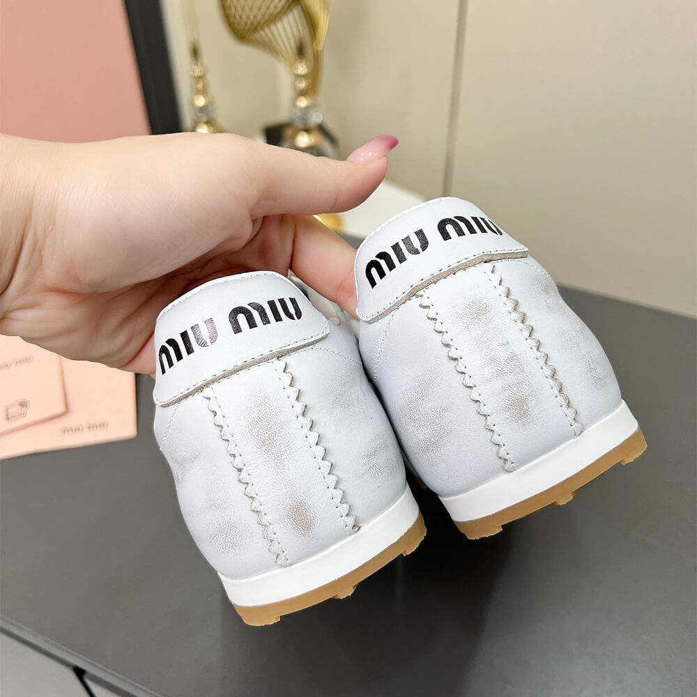 M1um1u Plume Sneakers